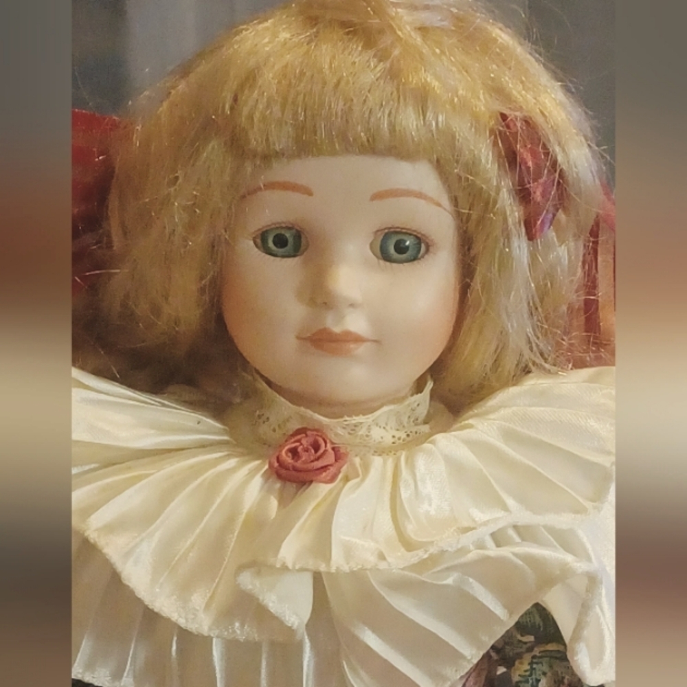 Porcelain Doll with Blonde Hair and Red Accents